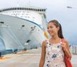 Cruise ship passenger leaving boat for shore excursion in harbour. Asian woman tourist spending a day in port of call of Caribbean travel destination.