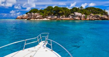 yacht in the sea near an island