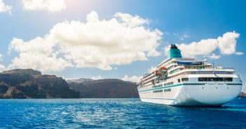 cruise ship sailing toward land