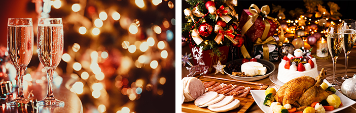 glasses of sparking wine and a Christmas dinner with festive decorations