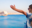 girl looking at cruise ship