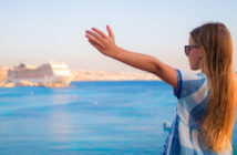 girl looking at cruise ship